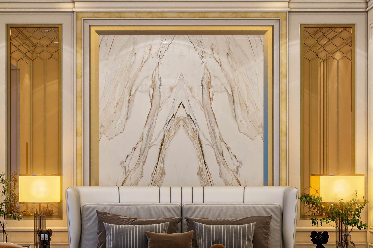 Book matched marble feature wall framed in brass with onyx side niches
