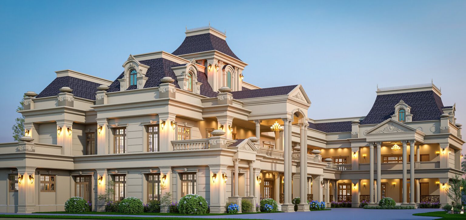 Classical manor elevation with slate blue roofs at dusk